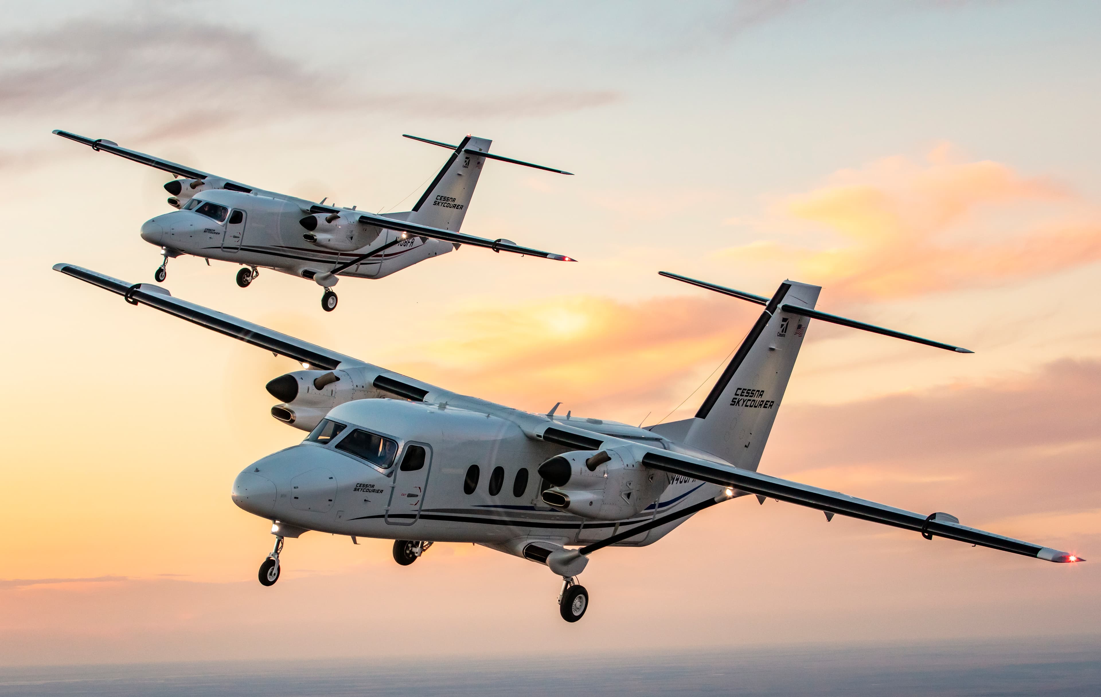 Cessna SkyCourier formation flight at sunset
